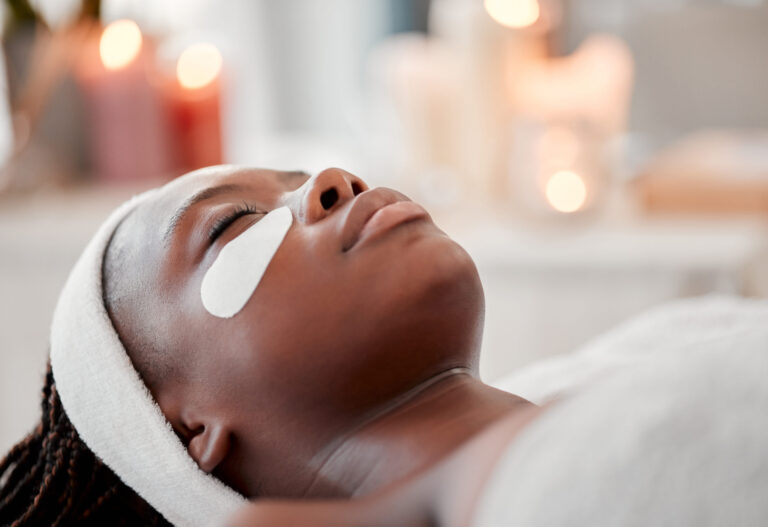 eyes-patch-and-black-woman-face-at-spa-beauty-an-2023-11-27-04-52-43-utc-scaled